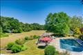Looking over the pool towards the pond from the roof deck