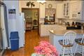 Kitchen access to heated side porch and rear dining room