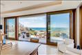 Huge sliding doors frame the water views