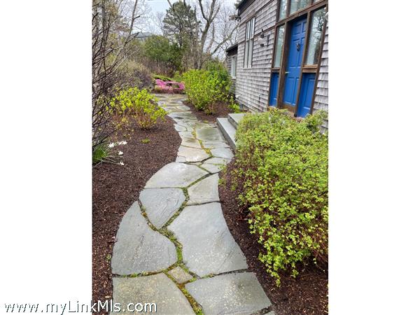 Stone walkway to Primary Home