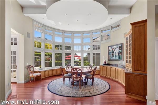 Dining room with water views and golf course fairway views
