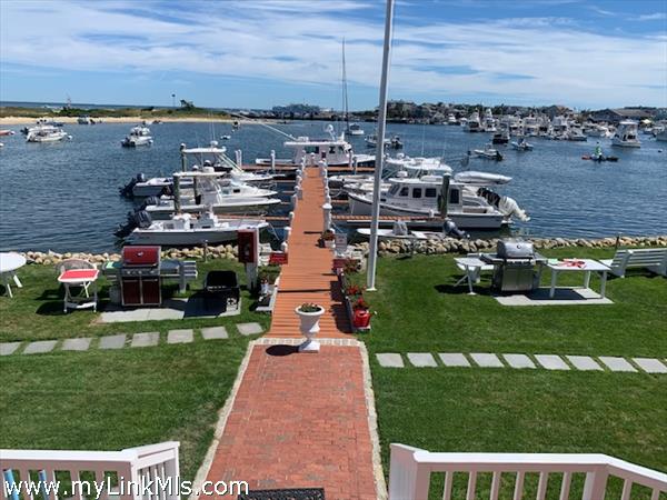 Outstanding water views, professionally landscaped, watch the fireworks from your porch, hop on your boat for that morning fishing trip and throw on the grill in the evening.