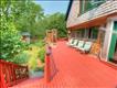 Large expansive deck overlooking spectacular gardens