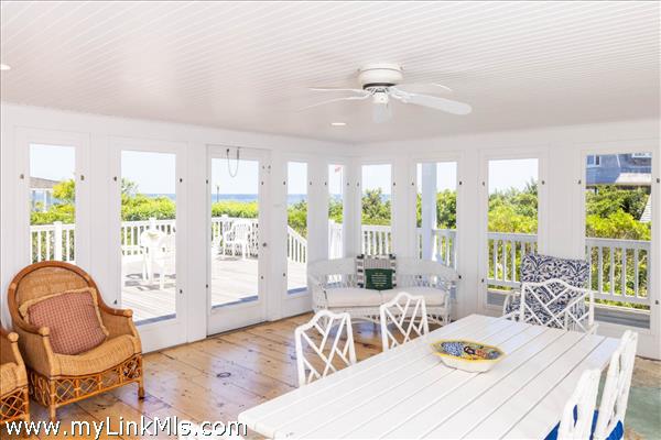 Screened-in porch with waterviews