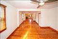 Streams of natural light flood the living and dining area