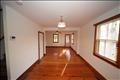 Open dining living area with original wide Pine and reclaimed Pine ..