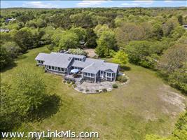 71 Runner Road over 1.1 acres of peaceful beauty.