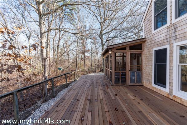 fabulous  newly restored mahogany deck overlooks sanctuary and will give you many peaceful hours listening to the birds or reading a book.