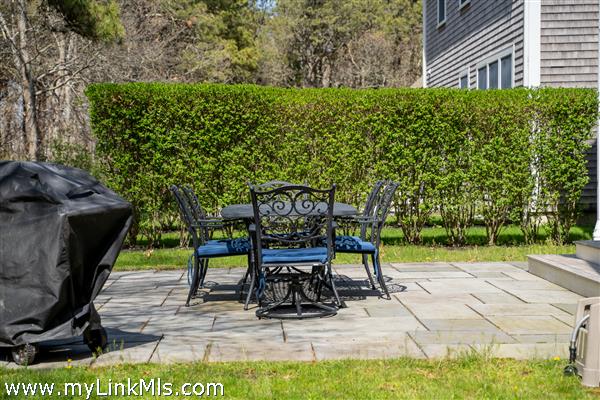 Bluestone patio with room for grill and outdoor dining.
