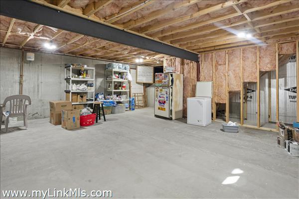 Unfinished basement under great room.