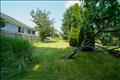 Side yard at the main house, neighbor on the other side of the fence