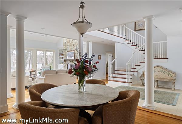 Formal dining room looking into the vaulted living room