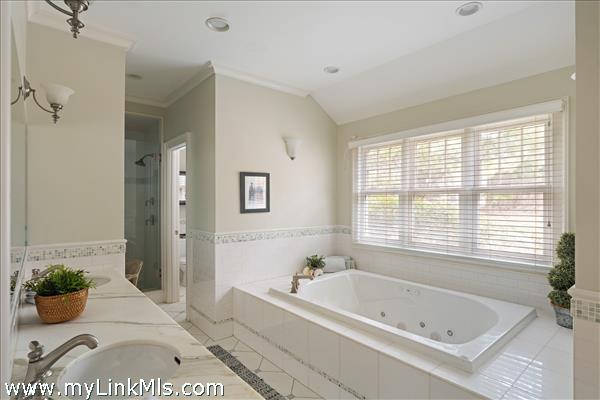 Expansive full bath with soaking tub