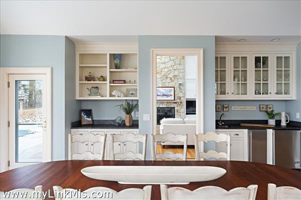 Wet bar with sink and beverage refrigerator
