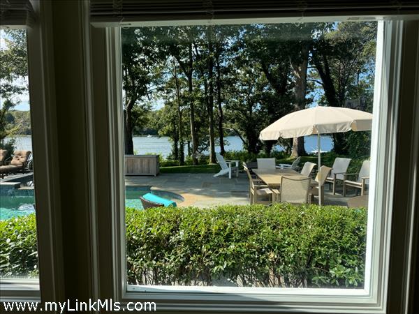 ...enjoys lovely pool and water views