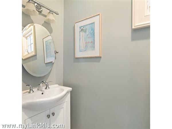 Half bath off the kitchen by the side entrance