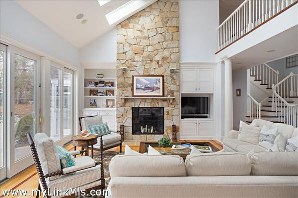 Floor-to-ceiling decorative stone fireplace