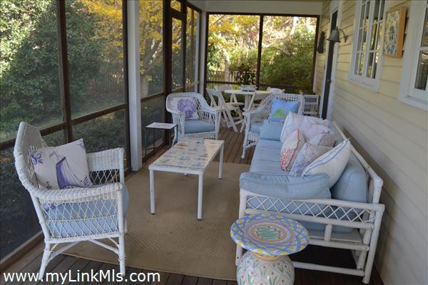 Welcoming entry screened in porch