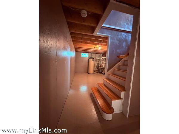 Stairs from first floor to basement