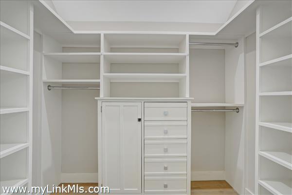 Walk-in closet in the primary bedroom.