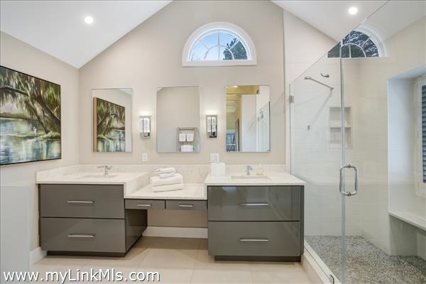 Primary en suite bath is spa-like.