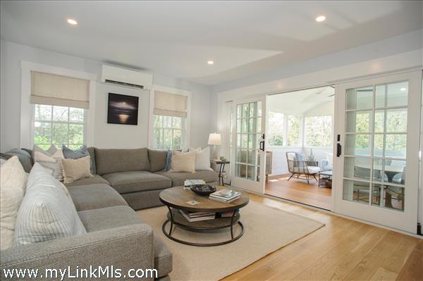 Living room toward screen porch.