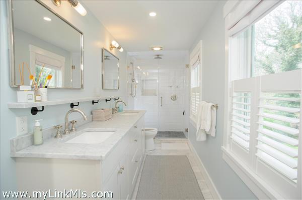 Primary bath with 7 feet of sink area.