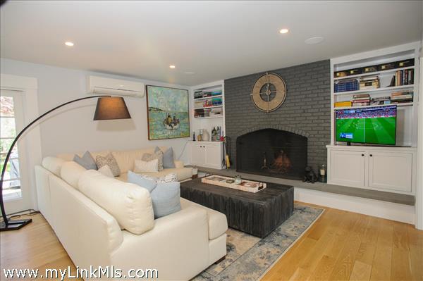 Wood burning fireplace with pop up TV you can close when not in use.