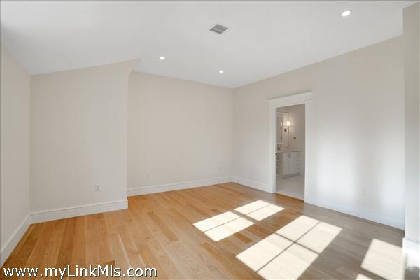 2nd floor middle guest bedroom with private full bathroom