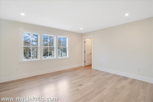 2nd floor middle guest bedroom with private full bathroom