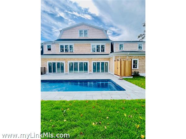 Outdoor shower near heated saltwater pool