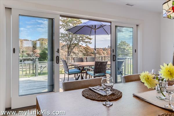 Dining room with doors to the deck