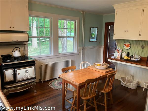 Kitchen with door leading to rear entrance