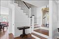 Central staircase in front foyer