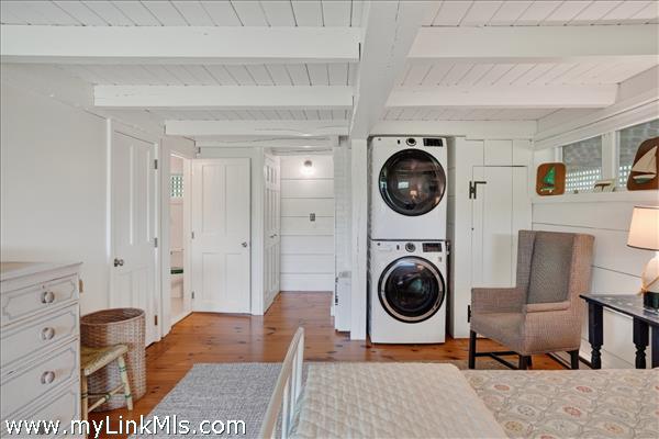 Lower-level bedroom with en suite bath.