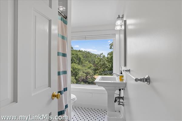 Full bath in the finished space above the garage.