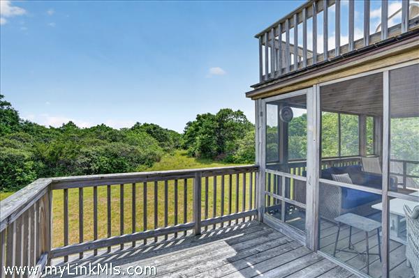 Deck wraps around the whole house.