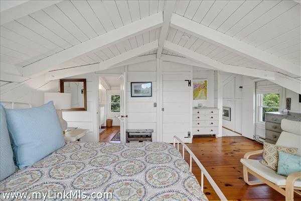 Second floor primary with en suite bath and private deck.