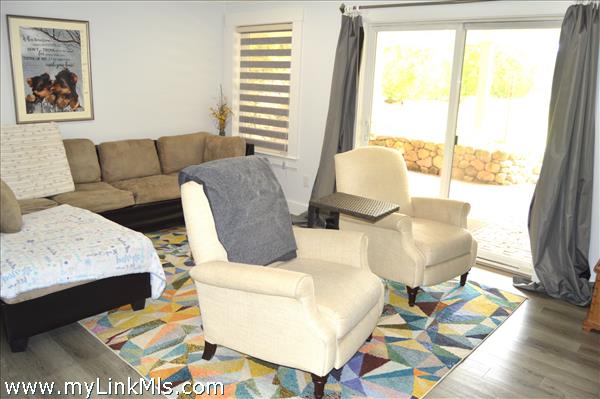second lounge area, opens to covered patio area
