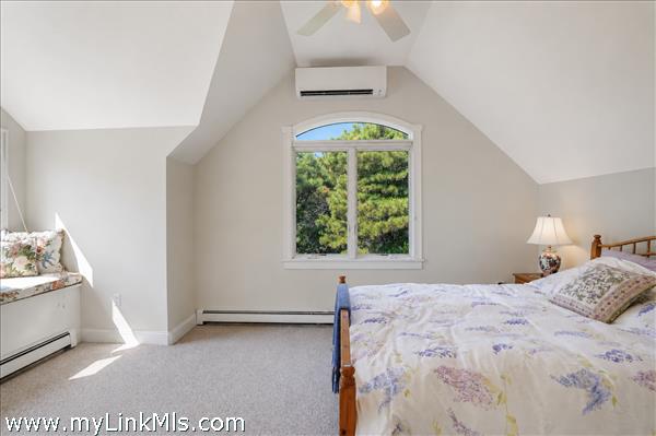 primary en-suite with private lounge area and private exterior deck