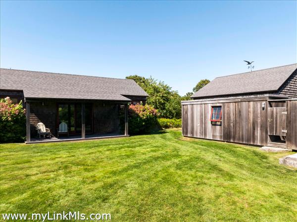 Guest House, garage, one of two outdoor showers