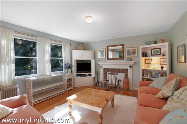 Main living area on second floor with fireplace