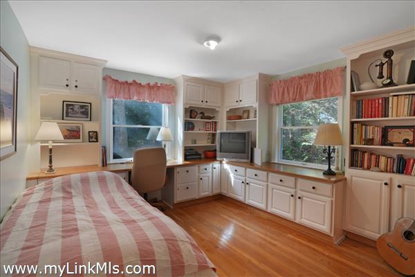 Bedroom with built in cabinetry