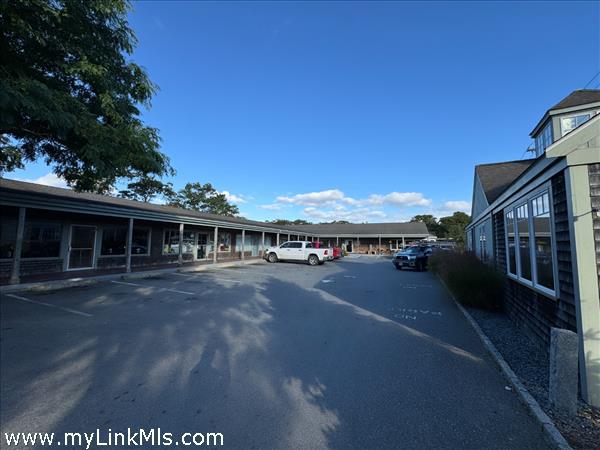 Shared parking with 70 spaces in a well-maintained parking lot.