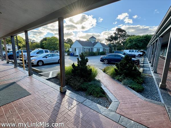 Brick pathways and pleasant landscaping welcomes customers.