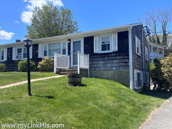 C-12 is an end unit with a nicely manicured entry way