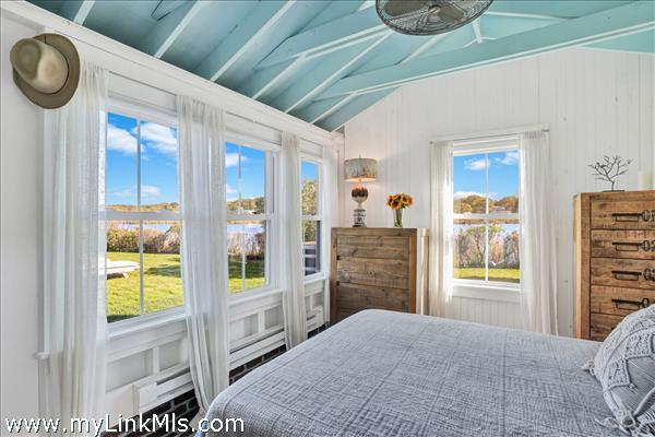 Bedroom with waterviews