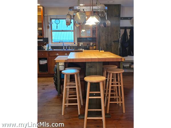 Kitchen view with back to dining area