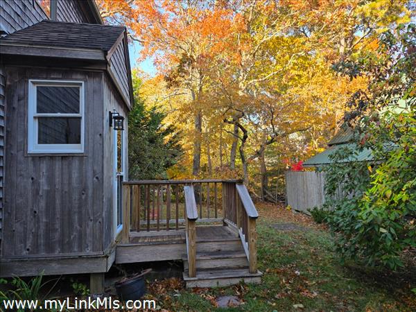 Front door on right hand side of the house