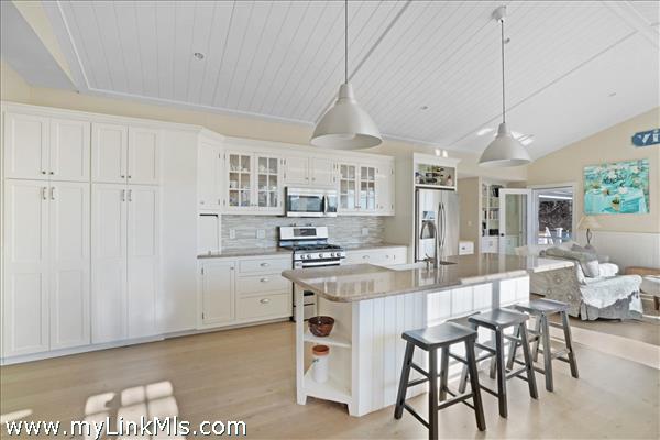 Open floor plan with center kitchen